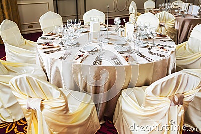 Indoor wedding table with beige decoration