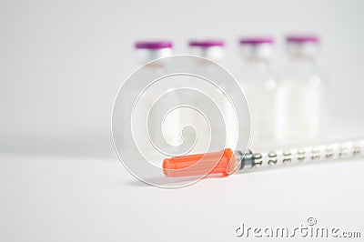 Injection vial and disposable syringe