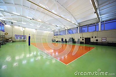 Inside school gym hall and volleyball net