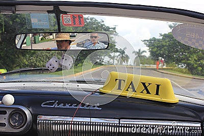 Inside a Typical Cuban Taxi, mirror reflection