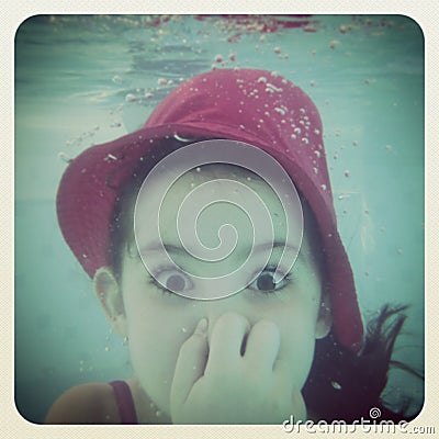 Instagram of young girl having fun under water