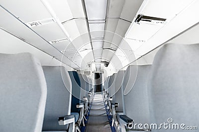 Interior of an airplane with many seats