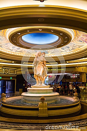 Interior of a luxurious hotel with marble greek statues