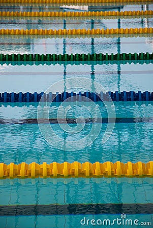 Interior of public indoor swimming pool with racing Lanes and bl