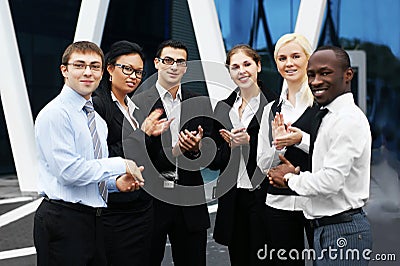 An international businessteam of six young persons