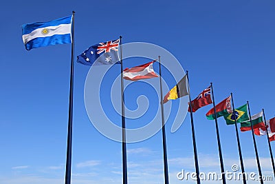 International flags on sky background