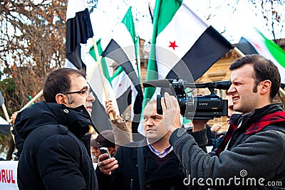 Interviewing a Syrian manifestant