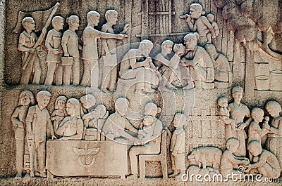 Intricate Thai carving mural - Thai King activity help people