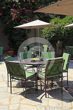 Iron tables and chairs in beautiful patio