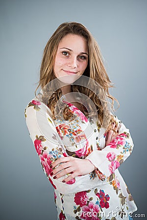 Isolated portrait of cheerful young teenager
