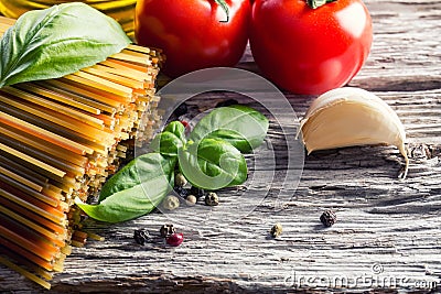 Italian and Mediterranean food ingredients on old wooden background.