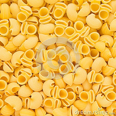 Italian Pipe Rigate Macaroni Pasta raw food background or textur