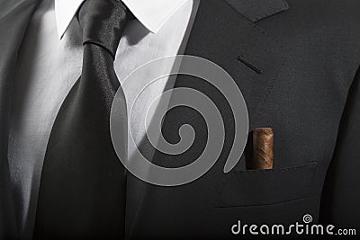 Jacket and tie with cuban cigar in the pocket, Italian fashion