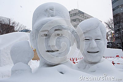 Japanese baseball coach with his player, Sapporo Snow Festival 2013