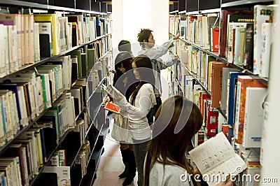 Japanese college student in library