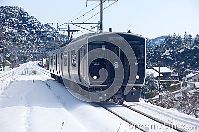 Japanese passenger train on a snowy day