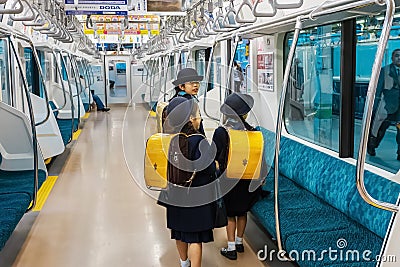 Japanese Stuedents on a Train