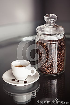 Jar of coffee and espresso cup