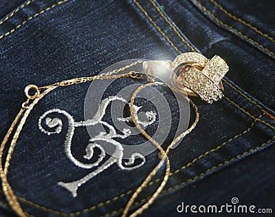 Jeans and diamond necklace