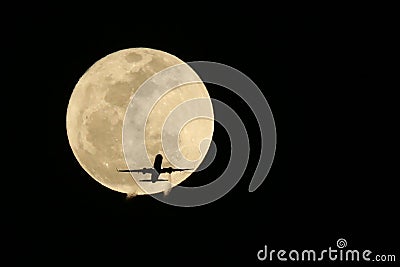 Jet Airplane Passing in front of a Full Moon- Real not Digitally
