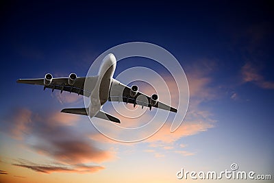 Jet Airplane Taking Off into Bright Twilight Sky