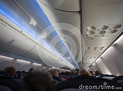 Jet cabin full of passengers