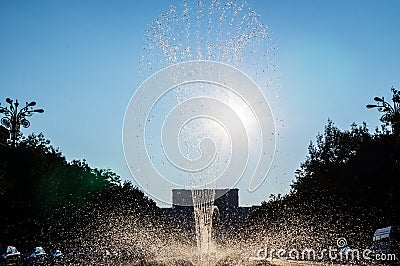 Jet fountain during very hot summer day