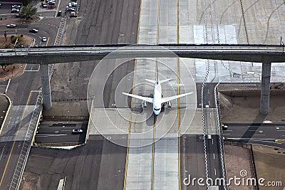 Jet over road and under bridge