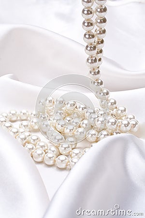 Jewels on white satin