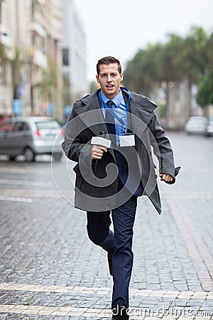 Journalist running street