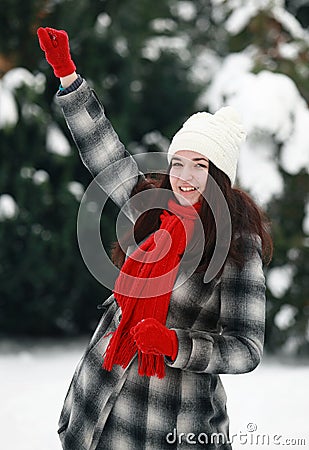 Joyfully young woman in winter
