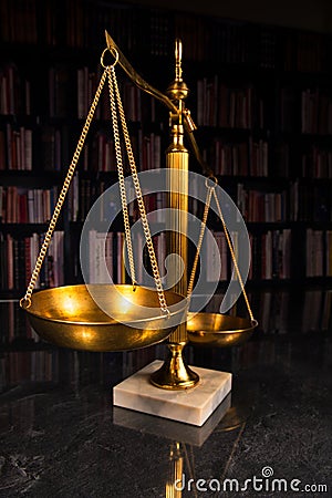 Justice scale with law books