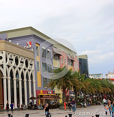 With the KFC logo building in the Shenzhen Sea World Plaza