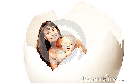 Kid With His Mother In The Egg. Mom With Baby In Her Arms 