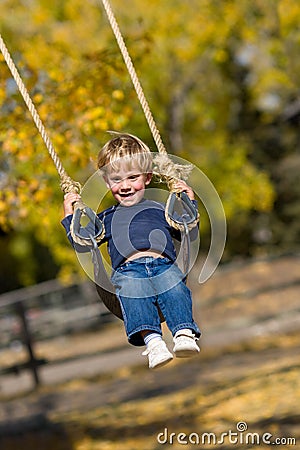Kid on swing