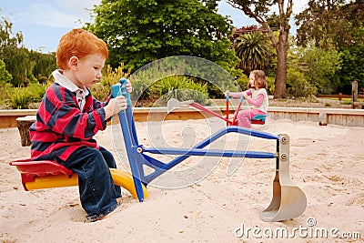 Kids Playing In Sandpit Stock Photo - Image: 1