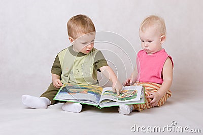 Kids read the book