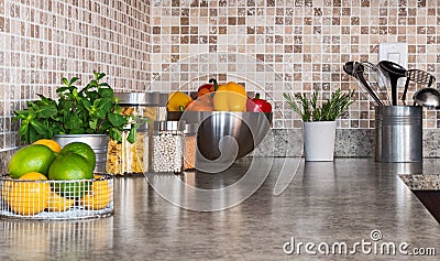 Kitchen countertop with food ingredients and herbs