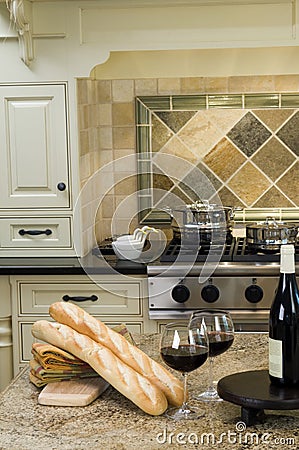 Kitchen island with wine and baguette french bread