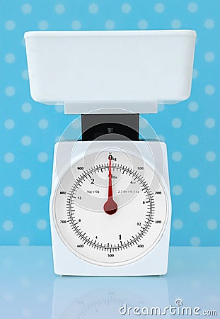 Kitchen scales weight loss diet concept