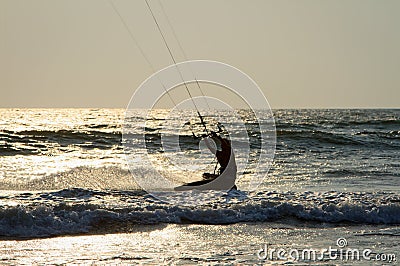 Kiteboarder enjoy surfing in the sea