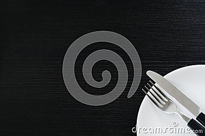 Knife and fork on a plate