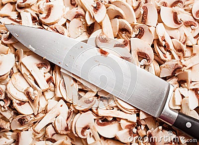 Knife and mushrooms