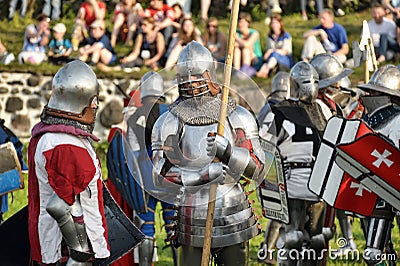 Knights in armor with shields