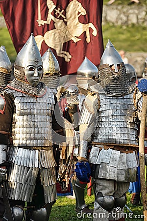 Knights in armor with shields