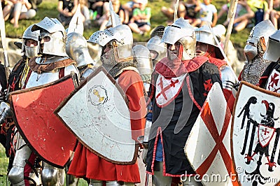 Knights in armor with shields