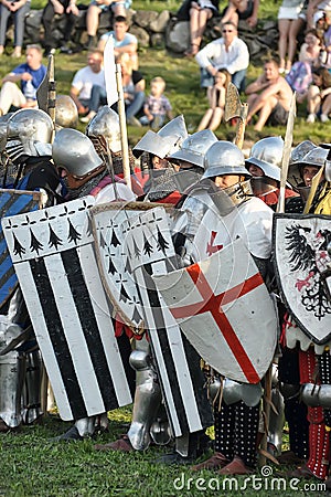 Knights in armor with shields