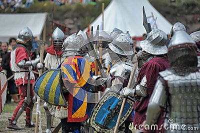 Knights in armor with shields