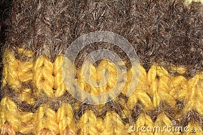 Knitted texture, yellow, brown wool, crafts