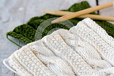 Knitting pattern and needles on a background